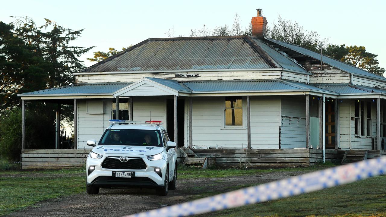 Police guarding a vacant house on Boundary Rd in Armstrong Creek after it caught fire. Picture: Alison Wynd