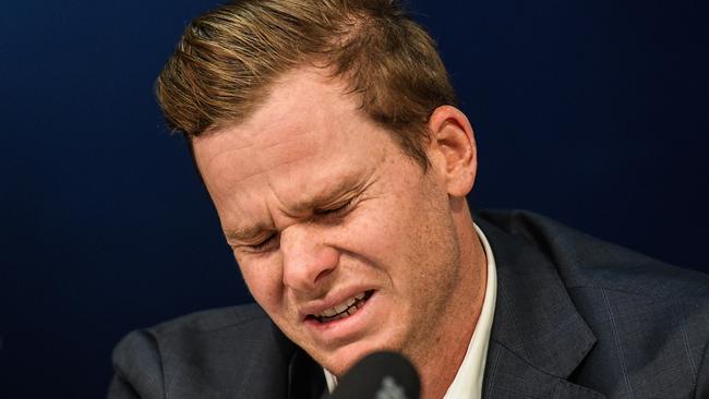 The weight of events is clear on Steve Smith’s face as he apologises for the ball-tampering incident in Sydney Airport on Thursday night.