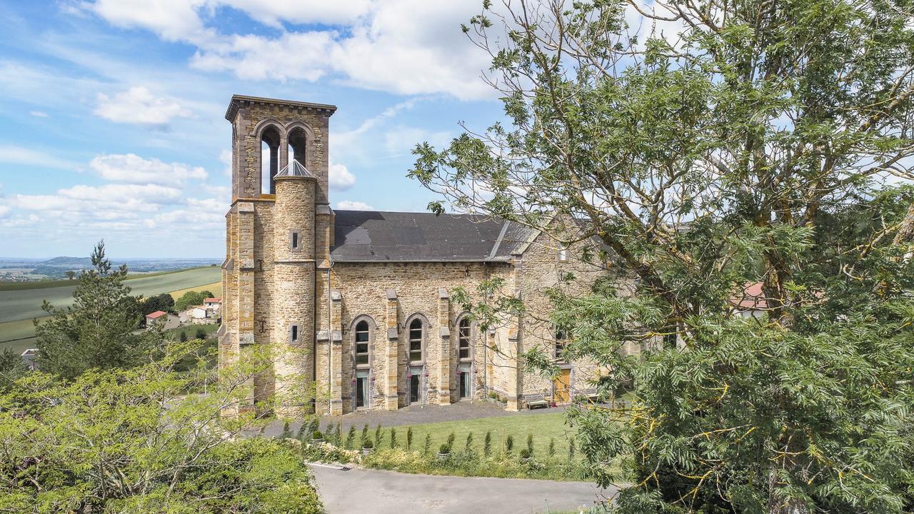 A Neo-Gothic church converted to a house, east of the city Clermont-Ferrand, France, that’s for sale with a $635,130 asking price (plus fees) in Australian currency. Picture: Groupe Patrice Besse.