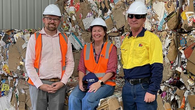 Mount Isa City Council's Chad King, Mayor Peta MacRae and recycling centre co-ordinator Richard Auld at the council's brand new recycling centre, which is anticipated to one day actually turn a profit for ratepayers alongside creating more non-mine jobs.