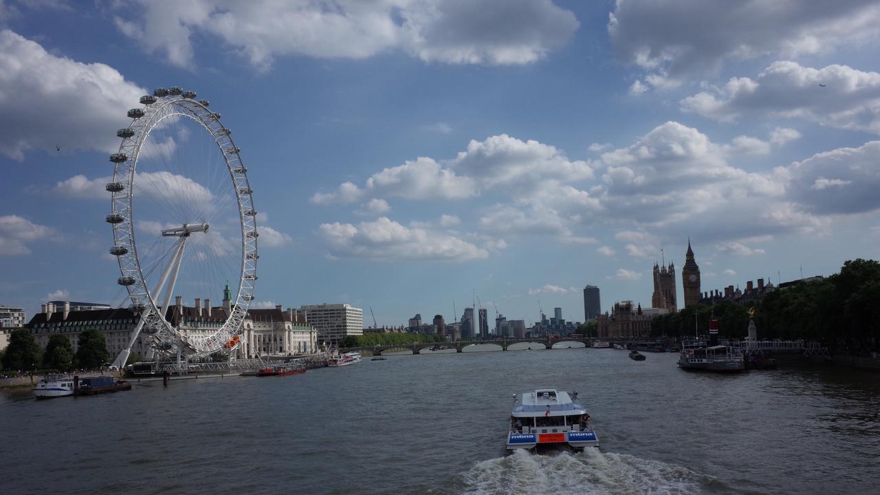 General view of the British Parliament and the Thames in London