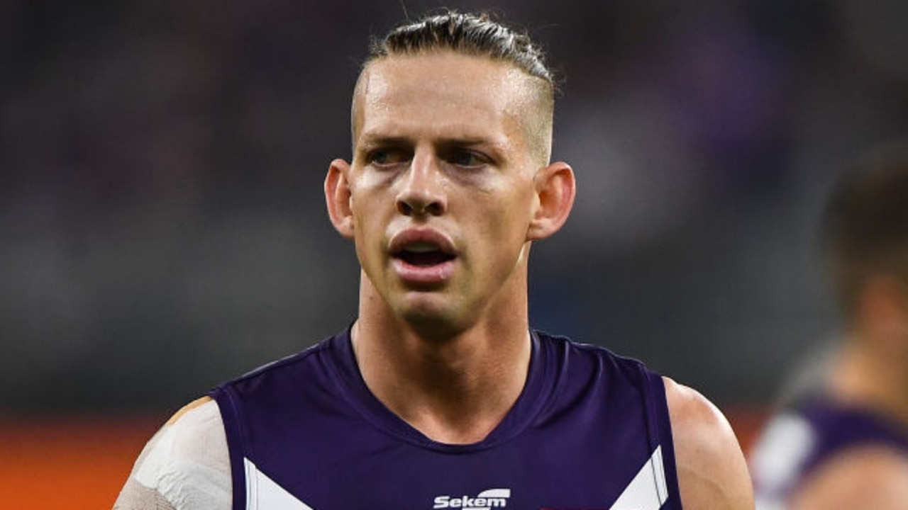 PERTH, AUSTRALIA - JULY 15: Nat Fyfe of the Dockers looks at his options during the 2021 AFL Round 18 match between the Fremantle Dockers and the Geelong Cats at Optus Stadium on July 15, 2021 in Perth, Australia. (Photo by Daniel Carson/AFL Photos via Getty Images)