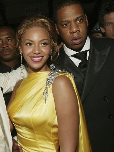 The rapper, pictured here with wife Beyonce, has denied the allegations.