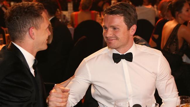 Joel Selwood congratulates Brownlow Medal winner Patrick Dangerfield. Picture: Wayne Ludbey