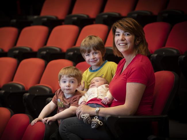 Dr Julia Shore has just graduated with a PhD in mathematics with her children Christopher 2, Benjamin 4 and Amberlynn 7weeks at the UTAS Sir Stanley Burbury Theatre.  Picture: Chris Kidd