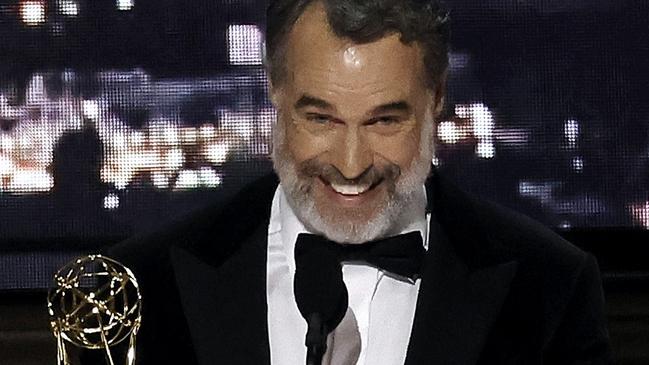 LOS ANGELES, CALIFORNIA - SEPTEMBER 12: Murray Bartlett accepts Outstanding Supporting Actor in a Limited or Anthology Series or Movie for "The White Lotus" onstage during the 74th Primetime Emmys at Microsoft Theater on September 12, 2022 in Los Angeles, California.   Kevin Winter/Getty Images/AFP