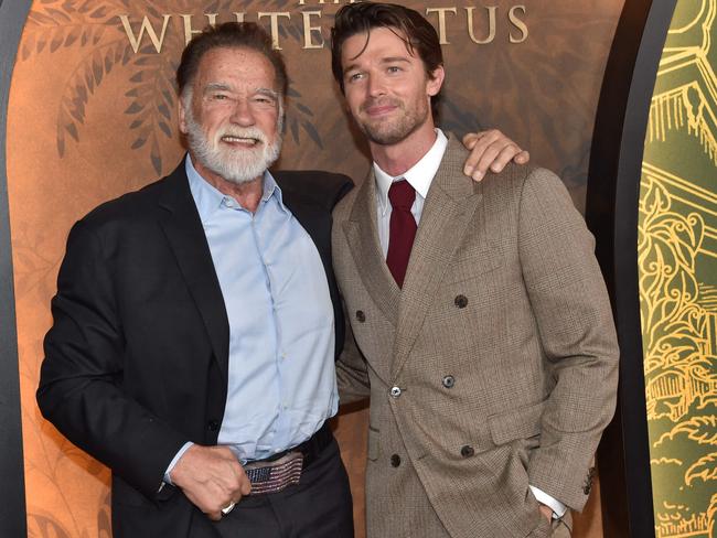 Patrick Schwarzenegger (right) with his father, Arnold Schwarzenegger, at the season three premiere of The White Lotus at Paramount Studios in Los Angeles on February 10. Picture: Chris Delmas/AFP