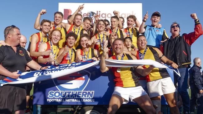 The Rosellas players toast to their first Division 1 title in 89 years. Picture: Valeriu Campan