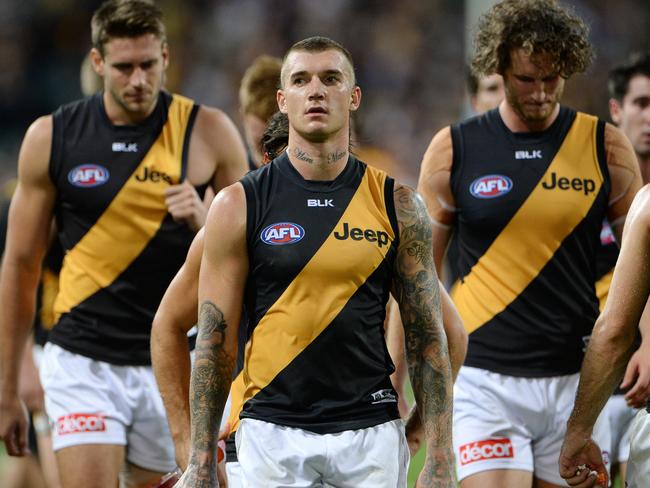 Dustin Martin leads the Tigers off the ground after the loss to West Coast. Picture: Daniel Wilkins