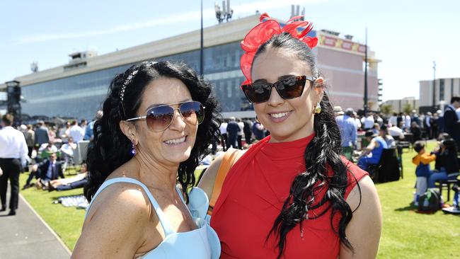 Caulfield Guineas horse race meeting, Caulfield, Victoria, Saturday 12th October 2024. Faces in the crowd. Pictured enjoying the race meeting are Rachel and Jade. Picture: Andrew Batsch