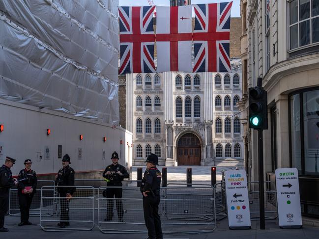 Police officers guard an entrance to Guildhall ahead of an official reception for dignitaries and members of the royal family following the service at nearby St Paul's Cathedral. Picture: Getty Images