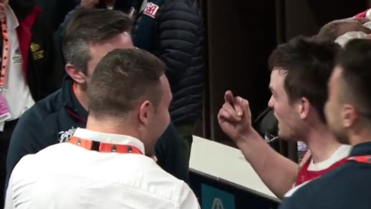 Luke Keary flips the bird and laughs in the sheds after the win.