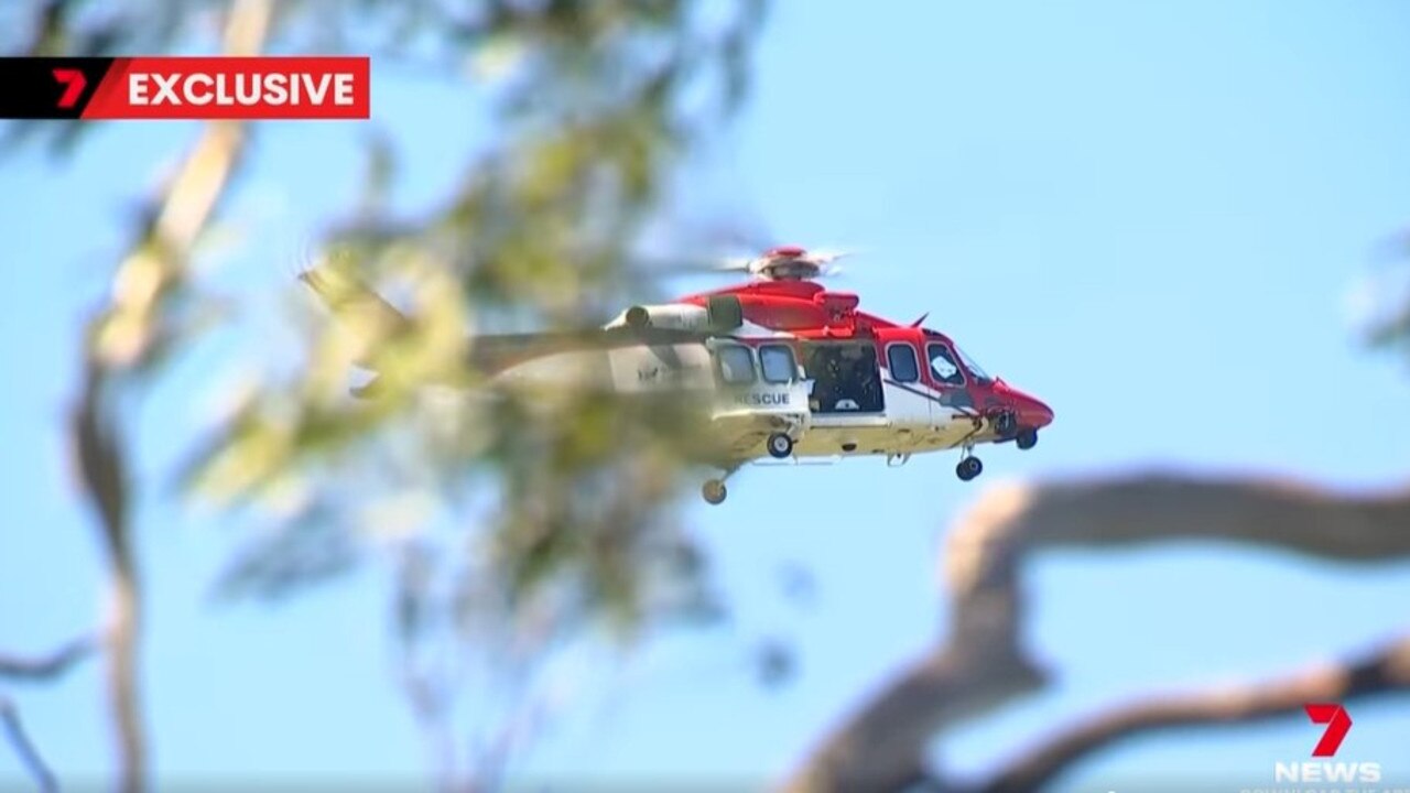 A 19-year-old has been winched to safety after he found himself caught in a precarious position during a Boxing Day climb. Picture: 7 News