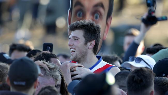 Mark Kovacevic stands heads and shoulders above the West Preston fans.