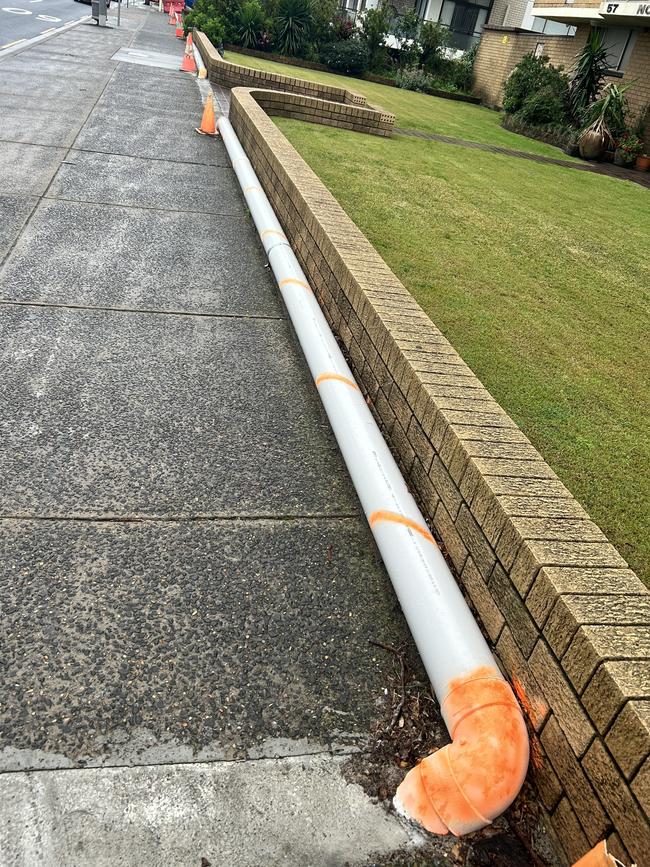 The water travels through this pipe on the street. Picture: Tileah Dobson