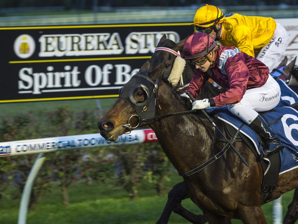 Jockey Alannah Fancourt guides Chevrons'n'rockers (outside) to win race one at Clifford Park Racecourse, Saturday, June 19, 2021. Picture: Kevin Farmer
