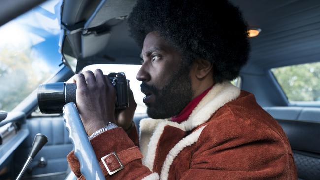 John David Washington plays an undercover cop who infiltrates the Ku Klux Klan in Spike Lee’s provocative and timely new film, BlacKkKlansman.