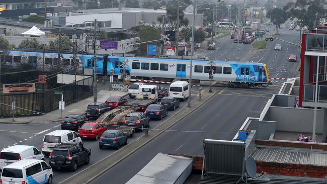 Boom gates are down for up to 40 per cent of morning peak hour. Picture: George Salpigtidis