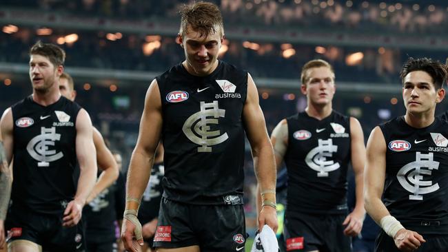 Carlton players trudge off the field after another loss. Picture: AFL Media/Getty