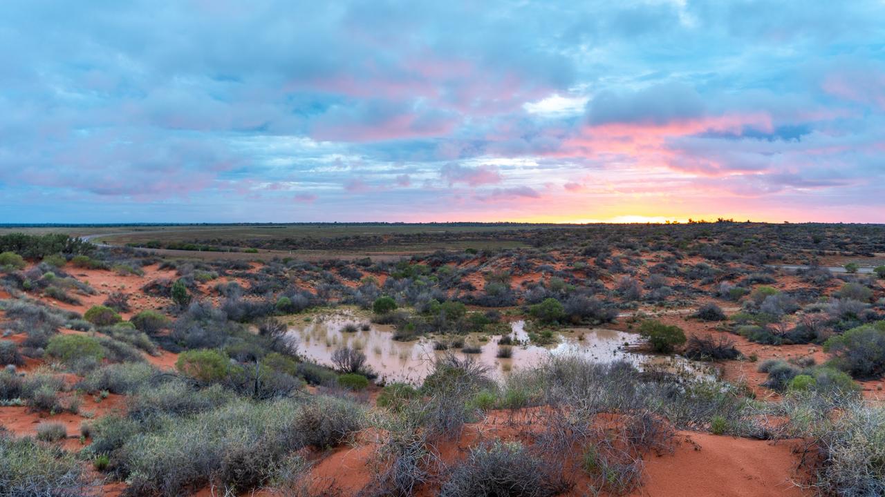 Sunset at Roxby Downs this evening, after a day of heavy rain and stormy weather across South Australia. Picture: Kyle Dadleh