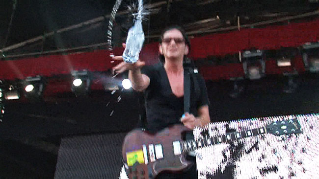 Screengrab of footage showing Placebo frontman Brian Molko throwing water at news.com.au video journalist, Helen Parker. Picture: news.com.au