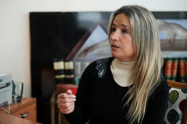 Natacha Romano, the lawyer of an Argentine woman who has accused two French international rugby players of rape, speaks during an interview with AFP