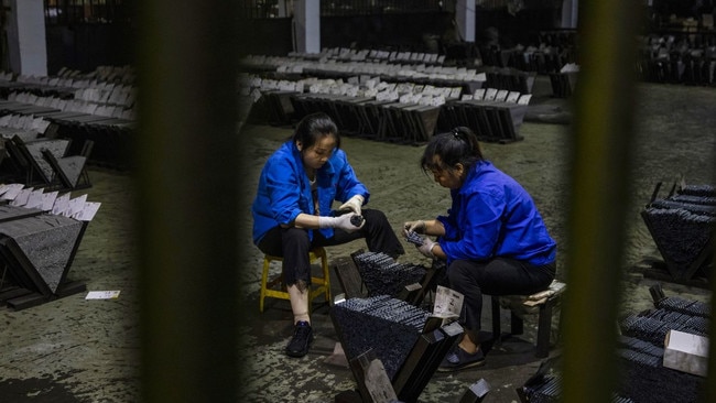 Workers at a Tiangong International factory in Zhenjiang, China. The company makes special steel-cutting tools. Picture: Alex Plavevski/Shutterstock/WSJ