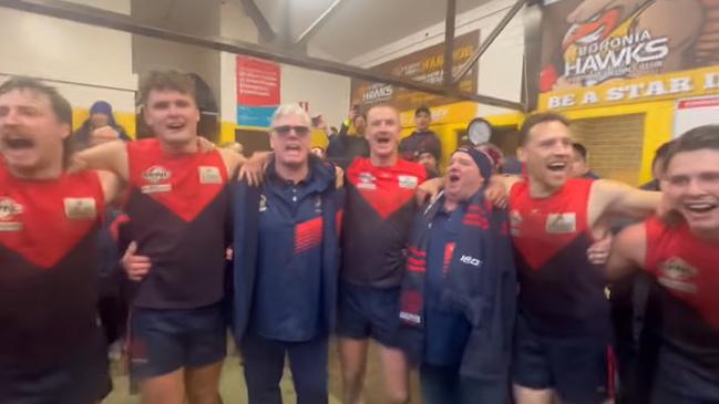 Ayres and his players belt out the song following Saturday’s win. Picture: Montrose FNC