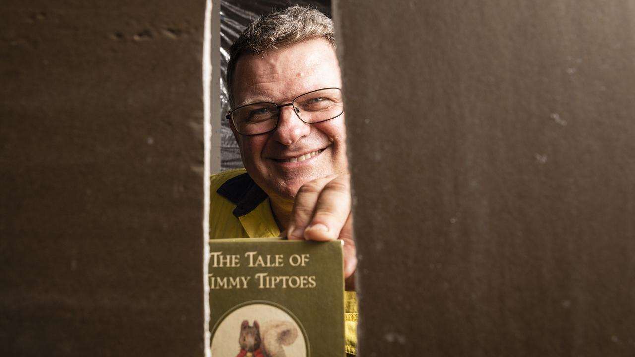 Andrew Fletcher found a Beatrix Potter book with a message written in it in a wall while renovating his Toowoomba home. Picture: Kevin Farmer