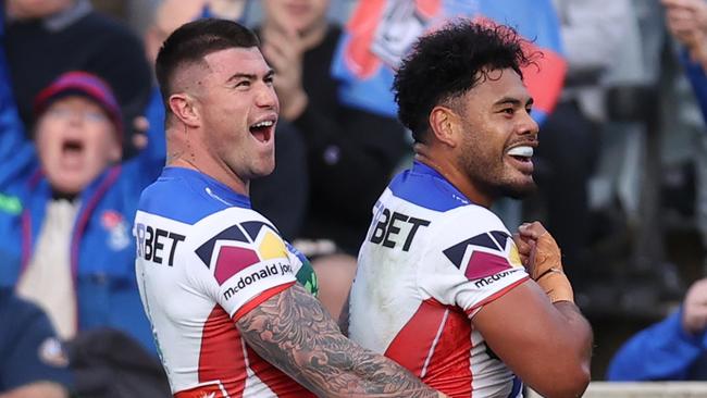 CANBERRA, AUSTRALIA - JULY 07: Greg Marzhew of the Knights celebrates scoring a try with Bradman Best of the Knights during the round 18 NRL match between Canberra Raiders and Newcastle Knights at GIO Stadium on July 07, 2024 in Canberra, Australia. (Photo by Jason McCawley/Getty Images)