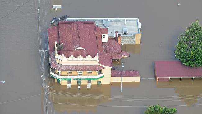 The Ulster Hotel in the CBD of Ipswich west of Brisbane is inundated by flood waters. Picture: AAP Image/Dave Hunt