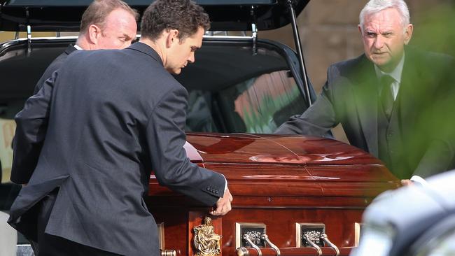 Funeral of murdered lawyer Joe Acquaro at St Mary's Star of the Sea catholic church in west melbourne.Joe Acquaro's coffin is taken into the church.Picture:Ian Currie