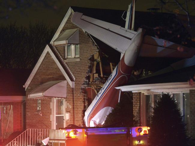 Damage ... The plane crashed through the home and into the basement. Picture: AP/Sun-Times Media, Brian Jackson