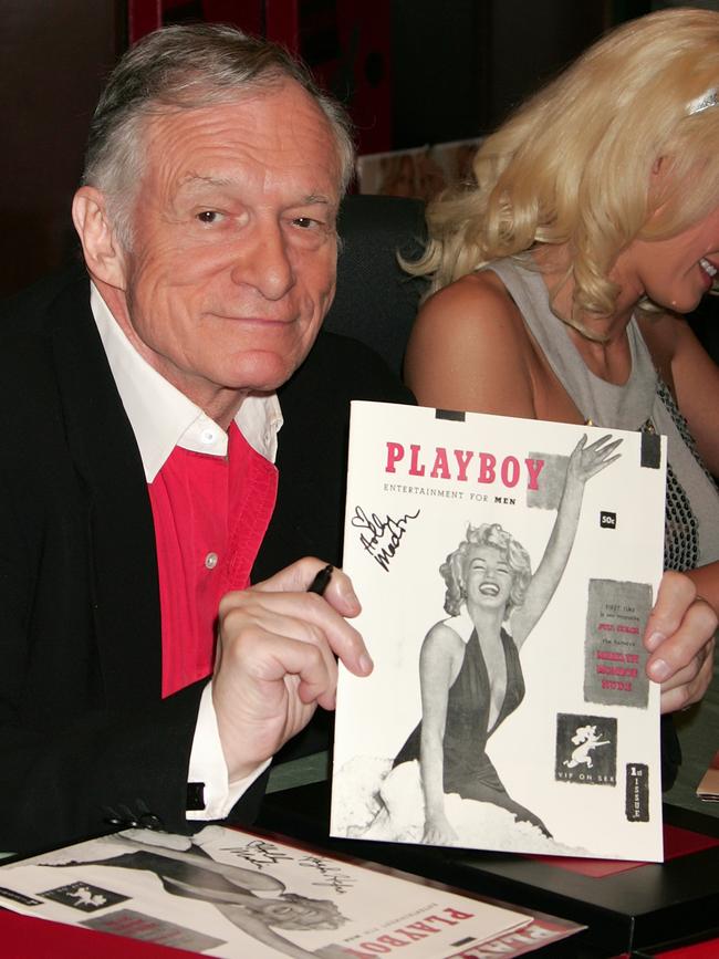 ‘Playboy’ magazine founder Hugh Hefner (L) and ‘The Girls Next Door’ reality series star Holly Madison attend a signing of ‘Playboy Cover to Cover: The 50s’ at Barnes & Noble Booksellers at The Grove on November 15, 2007 in Los Angeles, California. Picture: Getty