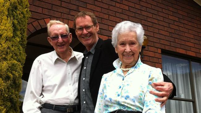 David and Nelda Edwards, and their son Stephen outside their home in Sandy Bay, Hobart.