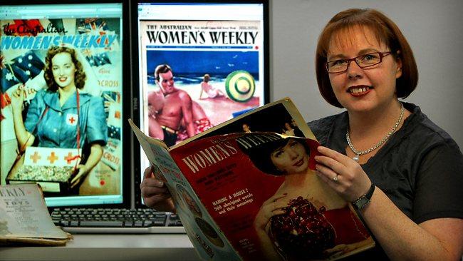 Cathy Pilgrim with old copies of Women's Weekly