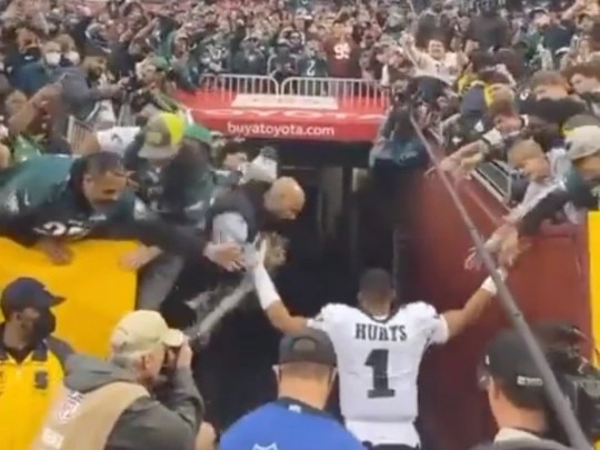 Jalen Hurts almost had a wall and fans fall on him as he left the stadium. Photo: Twitter