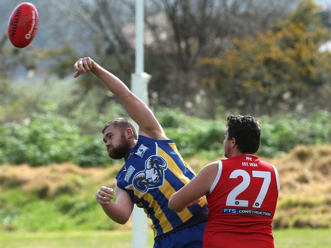 Christian Manna wins a hit out for Mt Lilydale. Picture: Hamish Blair