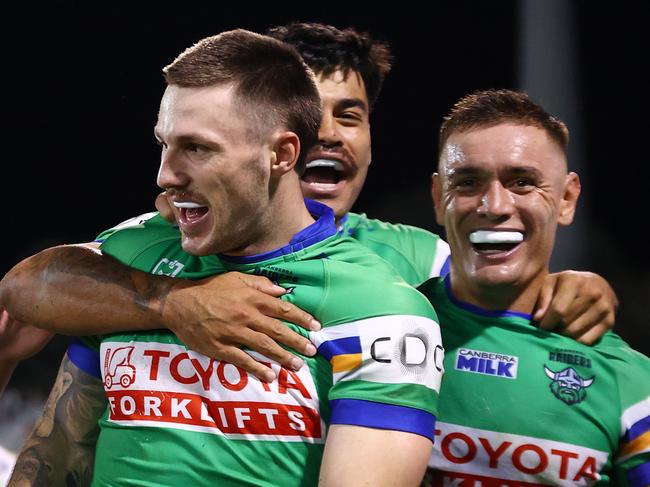 CANBERRA, AUSTRALIA - APRIL 07: James Schiller of the Raiders celebrates scoring a try with team mates during the round five NRL match between Canberra Raiders and Parramatta Eels at GIO Stadium, on April 07, 2024, in Canberra, Australia. (Photo by Mark Nolan/Getty Images)