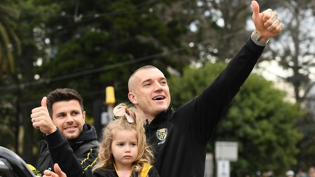 Dustin Martin and Trent Cotchin show love for the Tiger faithful. Picture: Getty Images