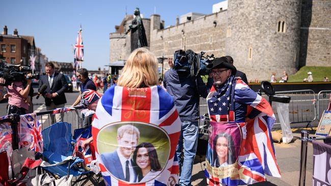 WINDSOR, ENGLAND - MAY 15:  Royal fans relax after setting up their positions ahead of a four day wait for the royal wedding of Prince Harry and Meghan Markle, on May 15, 2018 in Windsor, England.  (Photo by Leon Neal/Getty Images )