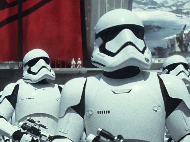 This photo provided by Disney shows stormtroopers in a scene from the new film, 