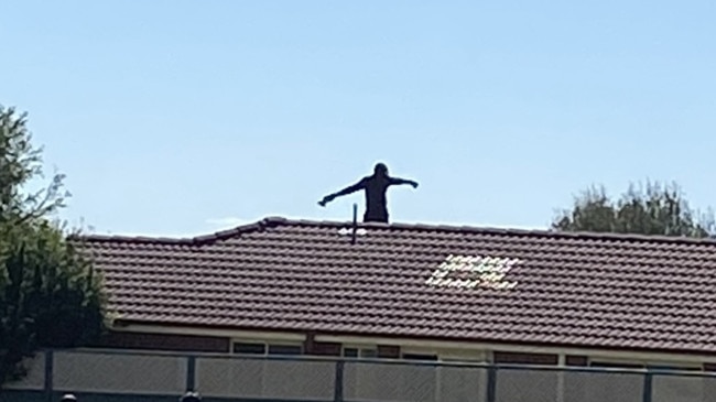 Police swarmed the home in Provan Pl in Dubbo after the man climbed onto the roof, yelling and throwing tiles.