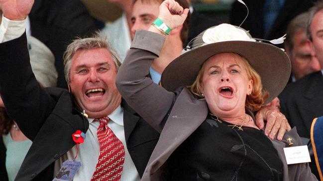 Part-owner of 'Rogan Josh', Darwin's Wendy Green and her husband Bob cheer 'Rogan Josh' to win the Melbourne Cup at Flemington Sport horse racing during the November 2, 1999 race.