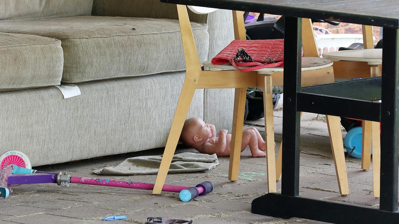 Toys strewn across the backyard. Picture: Liam Kidston