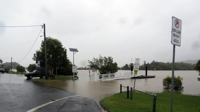 The Tweed River creeping up the boat ramp at Tumbulgum on Monday.