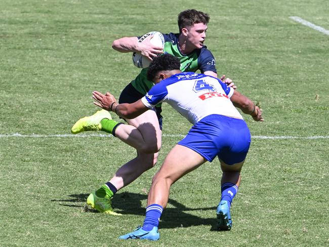 Reece Josephson tries to get past Genesis Ah Kam Sherlock. Picture: Martin Ollman