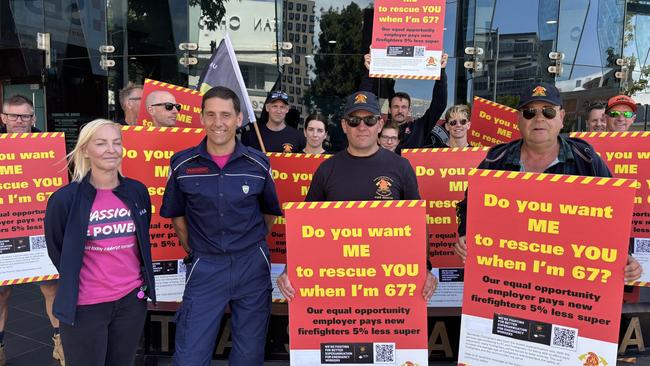 UFUA and HACSU members rallying outside the Tasmania Fire Service headquarters. Picture: Simon McGuire.