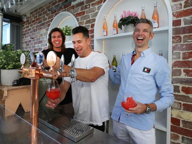 Media call for the opening of the new Surfers Pavilion which Artesian Hospitality has taken over. It was the old Helm Bar on the Surfers Riverfront. The Stafford brothers Mark and Chris,with Operator Matthew  Keegan behind the bar at the launch. Picture Glenn Hampson