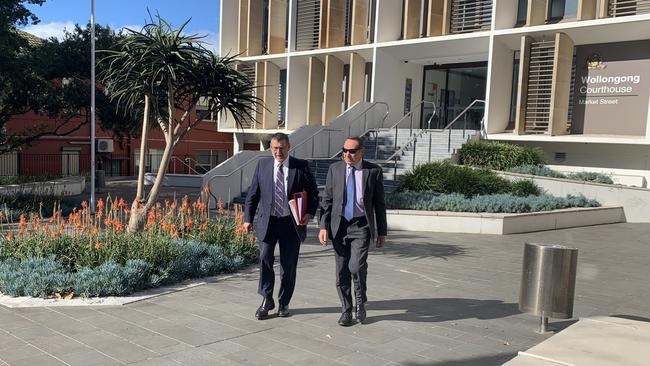 Nigel Duncan (right) leaving Wollongong Local Court on May 8. 